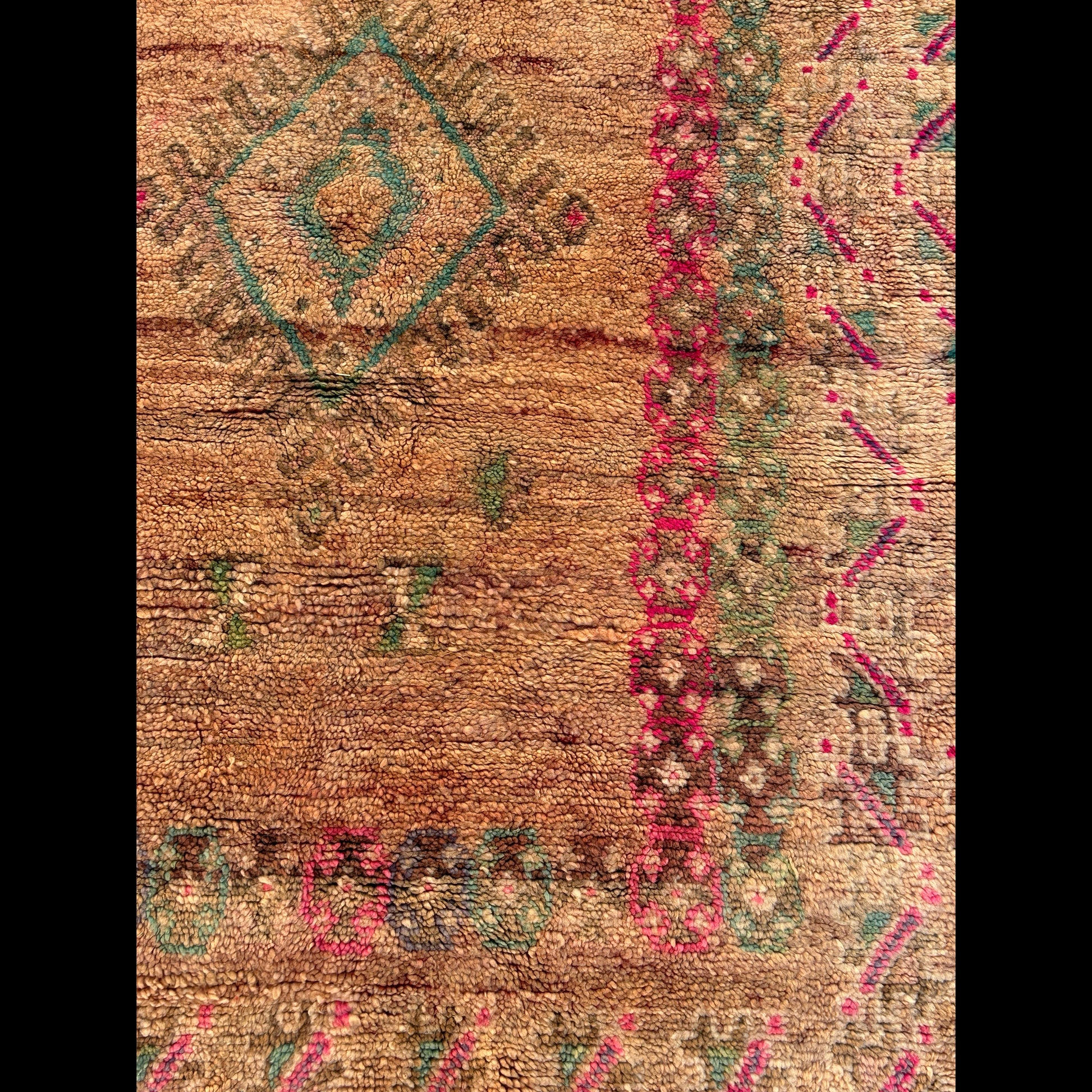 Close-up of the frame showing the shift from magenta and teal to purple and light brown, featuring tiny inset diamonds.
