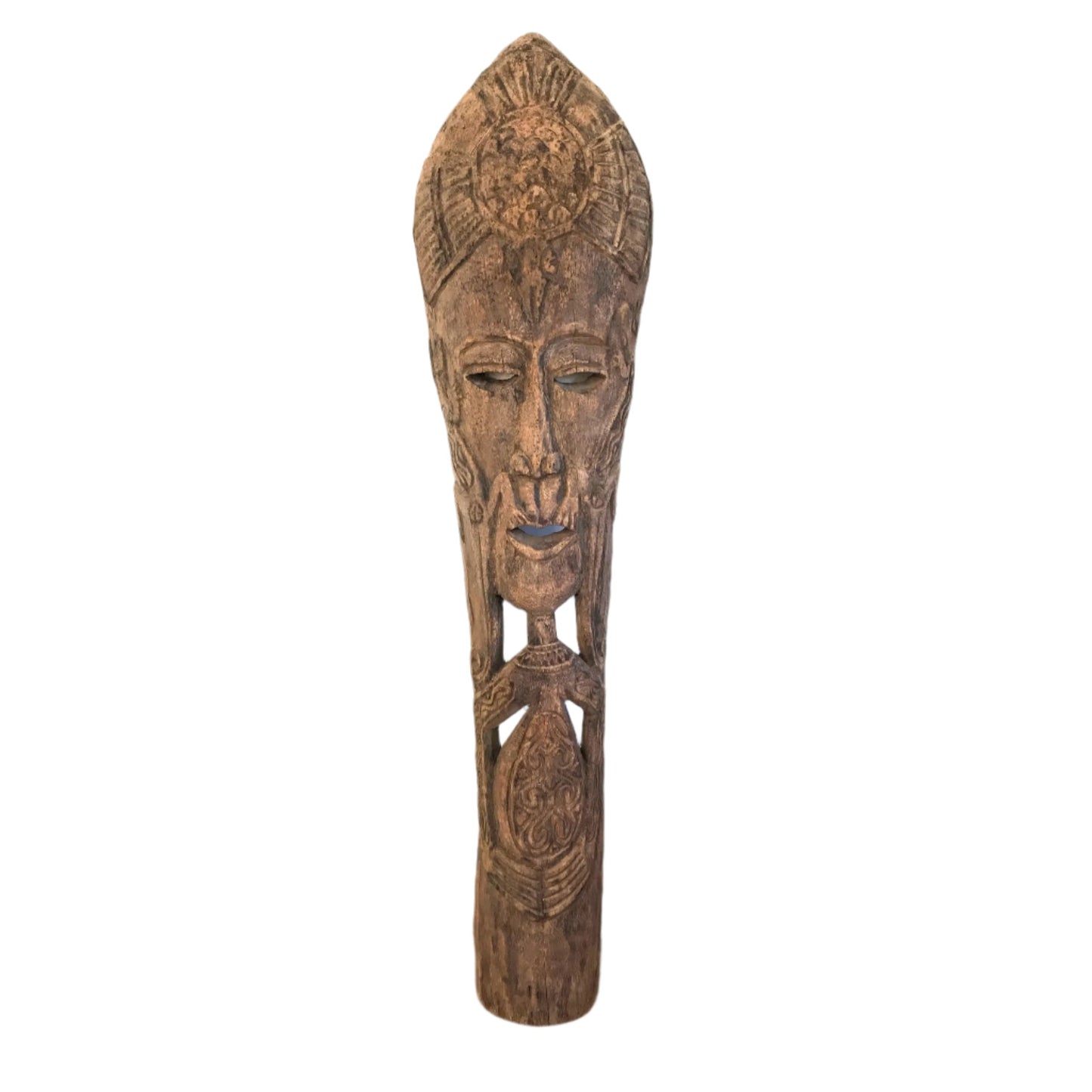 A tall, slender hand-carved coconut wood totem with a distinctive fibrous grain and a tribal-inspired face.