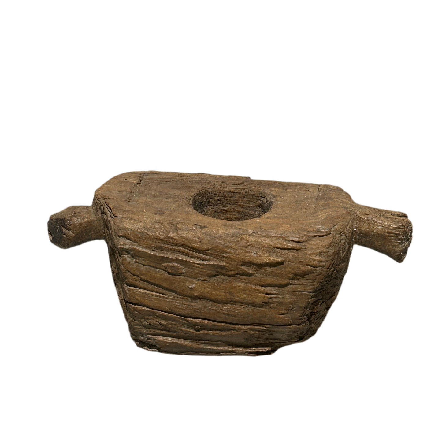 Indonesian Teak wood grinder with two handles, carved from a single block of teak hardwood.
