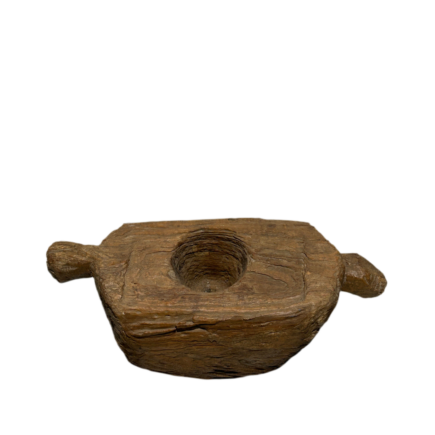Indonesian Teak wood grinder with two handles, carved from a single block of teak hardwood. Top down view.