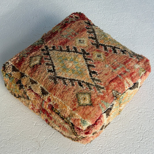 Kasbah vintage Moroccan floor cushion featuring terracotta, sage and sand tones with traditional tribal motifs, handcrafted and sourced from Morocco.