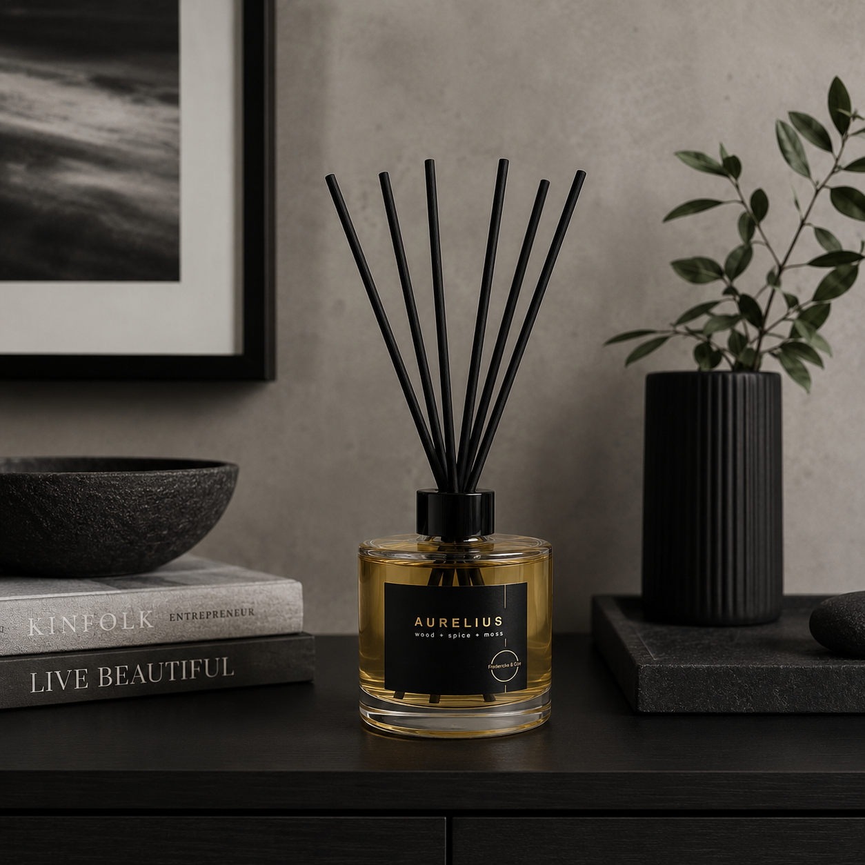Aurelius diffuser on a dark surface with decor items in the background