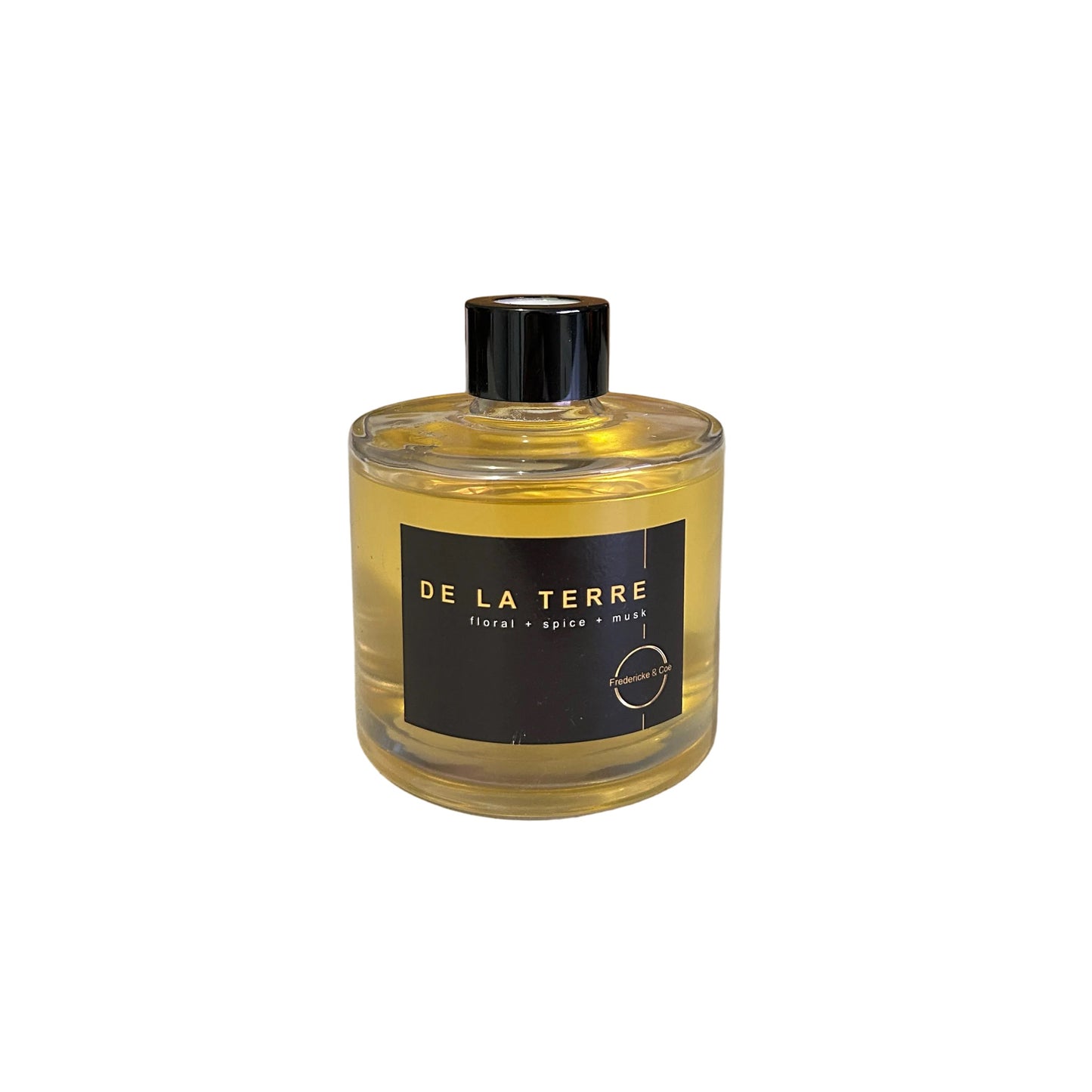Bottle of 'De La Terre' product on a white background
