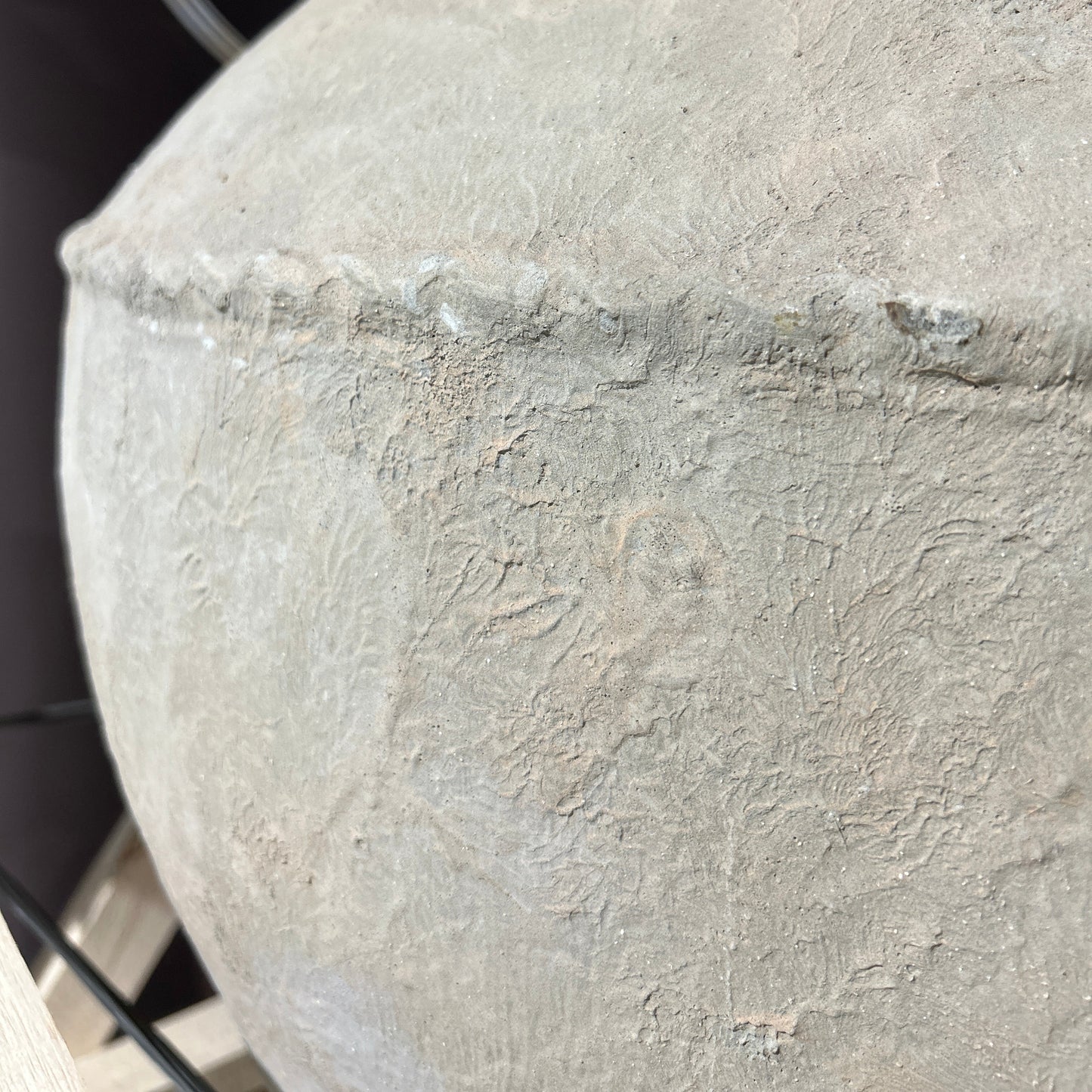 Close-up of The Petra Vessel with textured beige pot surface showing hand finish patina.
