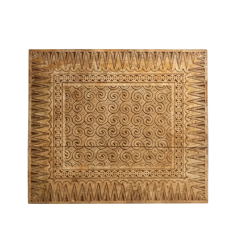 Decorative wooden panel with intricate carvings on a plain background