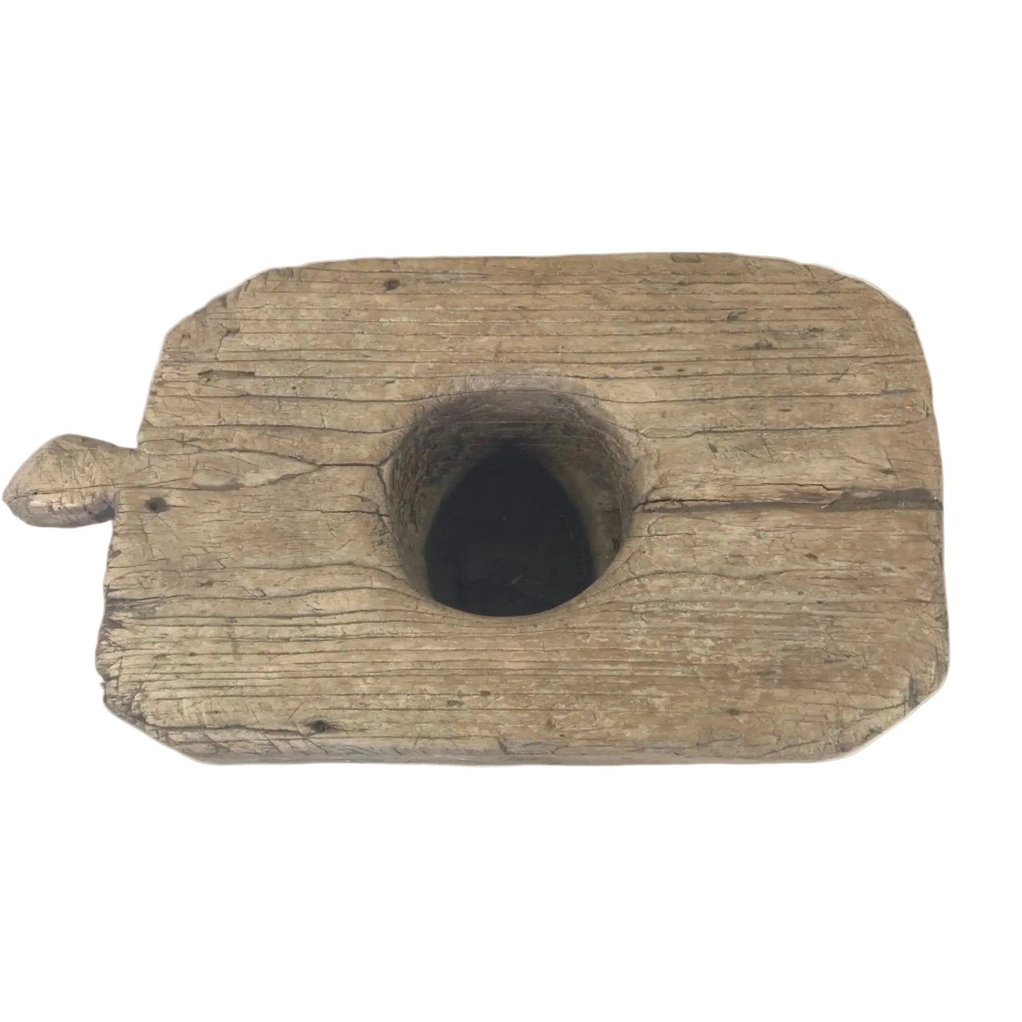 Top down view of an antique wooden grinder with a single handle.